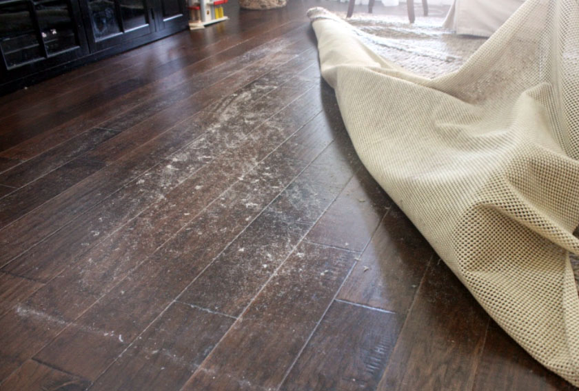 https://capitalrugcleaning.com/wp-content/uploads/2017/03/synthetic-rug-pad-floor-damage.jpg